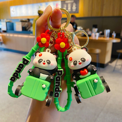 Un buen precio. Pendientes de llavero de silicona para el bolso, lindos amuletos de llavero de panda en línea