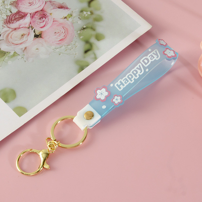 Lámina de llave de silicona con colgante luminiscente personalizada para muñeca brazaletes de llave para llaves o carteras