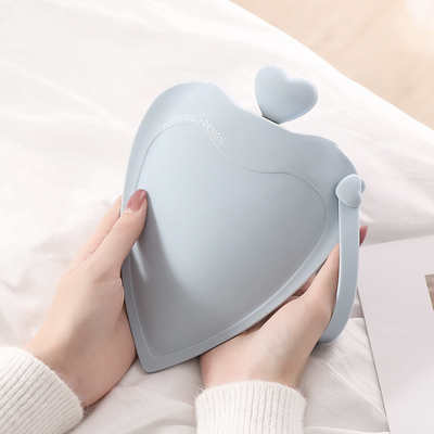 Un buen precio. Bolsa de agua caliente de silicona pequeña con tapa de punto para aliviar el dolor cintura espalda cuello calambres menstruales en línea